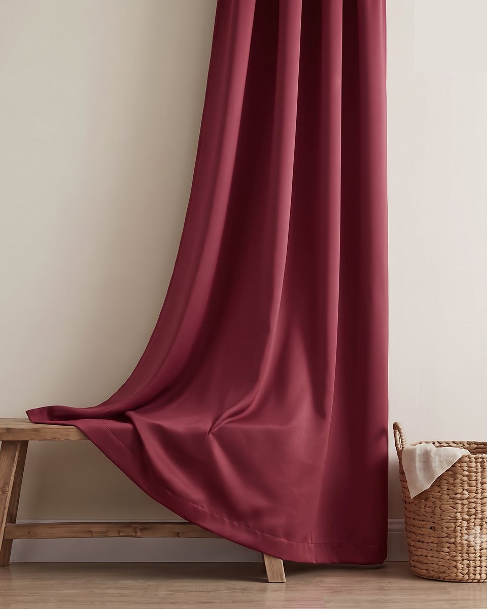 A Panda Living curtain draped over a wooden bench, catching soft natural light